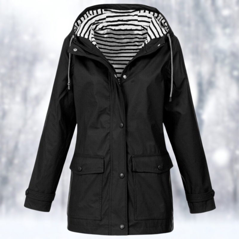 "Wasserdichte Damen Kapuzenjacke, stilvolles Design in Blau, perfekt für kalte, nasse Tage, mit ergonomischer Passform."