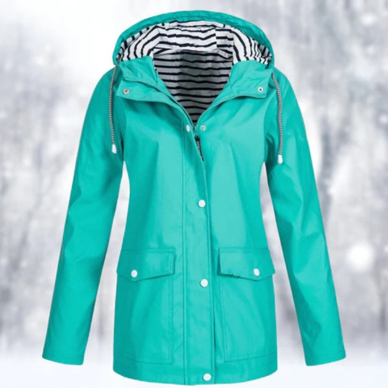 "Wasserdichte Damen Kapuzenjacke, stilvolles Design in Blau, perfekt für kalte, nasse Tage, mit ergonomischer Passform."