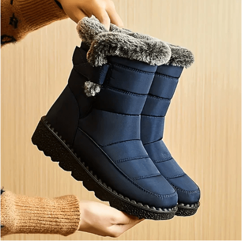 "Wasserdichte Damen-Winterstiefel, elegant, rutschfeste Sohle, warm gefüttert, ideal für Schnee und Regen."