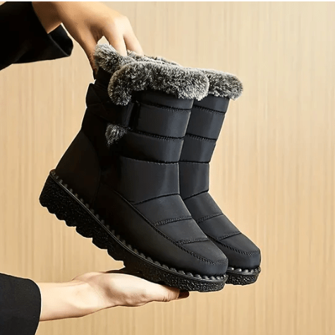 "Wasserdichte Damen-Winterstiefel, elegant, rutschfeste Sohle, warm gefüttert, ideal für Schnee und Regen."
