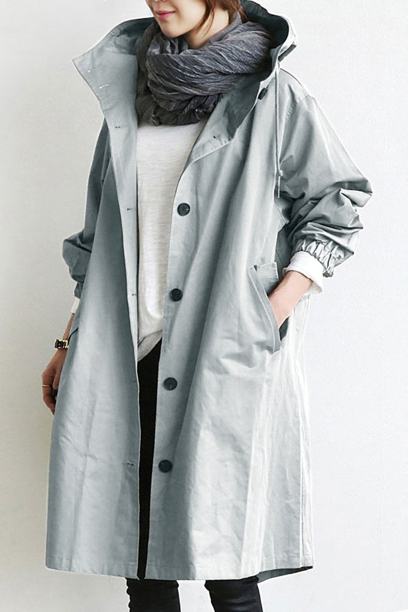 "Wasserdichter Damen-Trenchcoat mit Kapuze, eleganter Schnitt, ideal für Regenwetter, Vorderansicht, stilvoll und funktional.