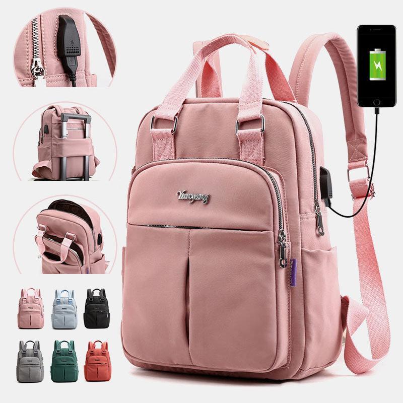 "Wasserfester Rucksack mit USB-Ladung, große Kapazität, schwarz, Vorderansicht; ideal für Reisen und Alltag."