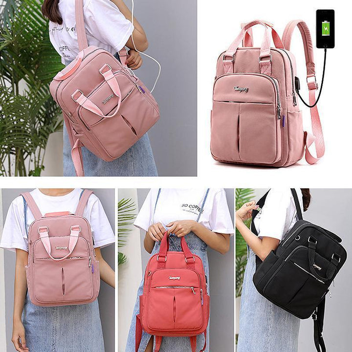 "Wasserfester Rucksack mit USB-Ladung, große Kapazität, schwarz, Vorderansicht; ideal für Reisen und Alltag."