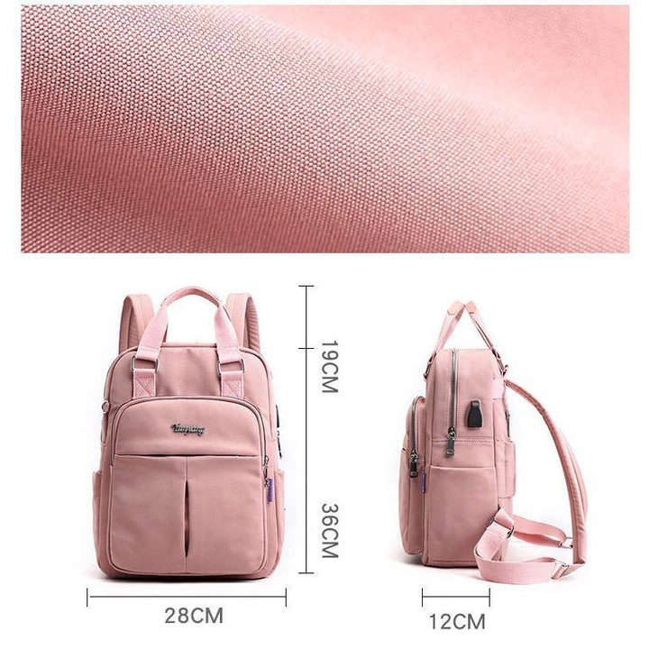 "Wasserfester Rucksack mit USB-Ladung, große Kapazität, schwarz, Vorderansicht; ideal für Reisen und Alltag."