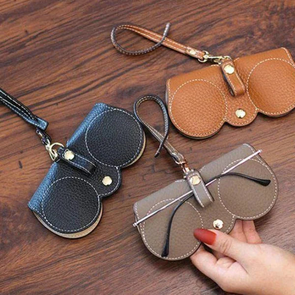 "Weiches Leder-Sonnenbrillenetui in Braun, kompakt und strapazierfähig, idealer Schutz für Damenaccessoires unterwegs."
