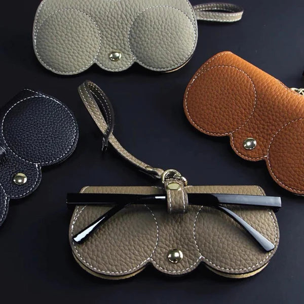 "Weiches Leder-Sonnenbrillenetui in Braun, kompakt und strapazierfähig, idealer Schutz für Damenaccessoires unterwegs."