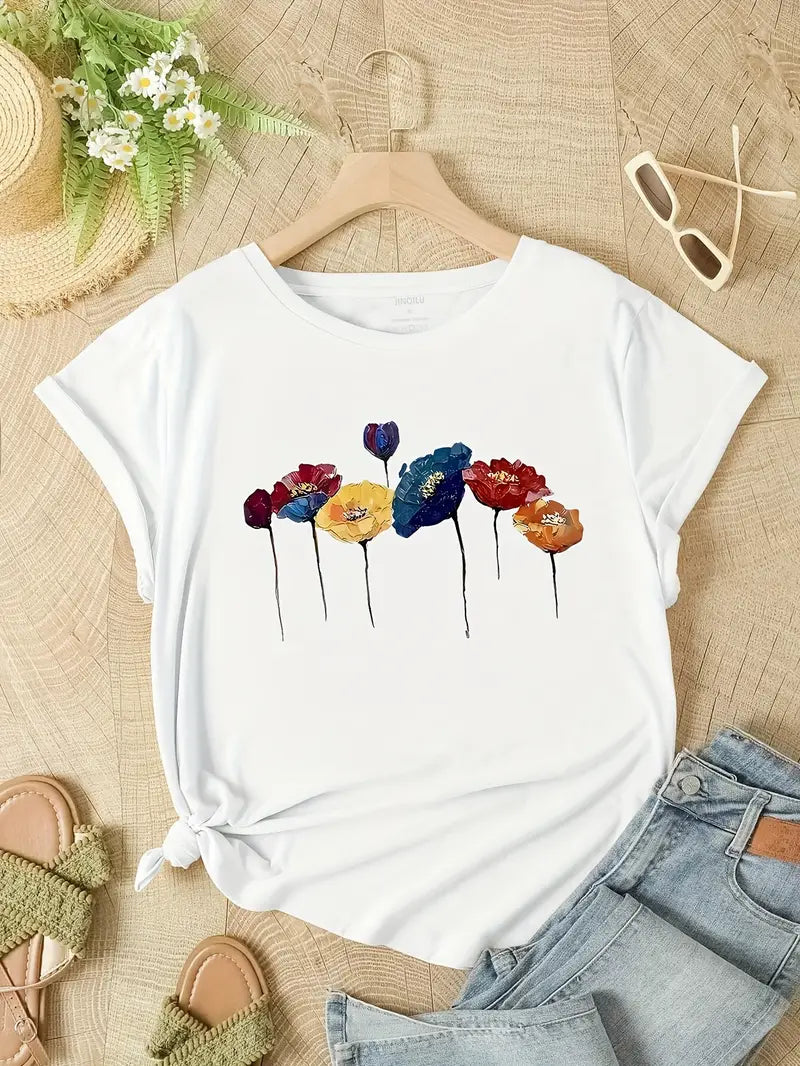 "Weißes Damen T-Shirt mit lebendigem Blumenmuster, ideal für sommerliche Looks, casual sowie vielseitig kombinierbar."