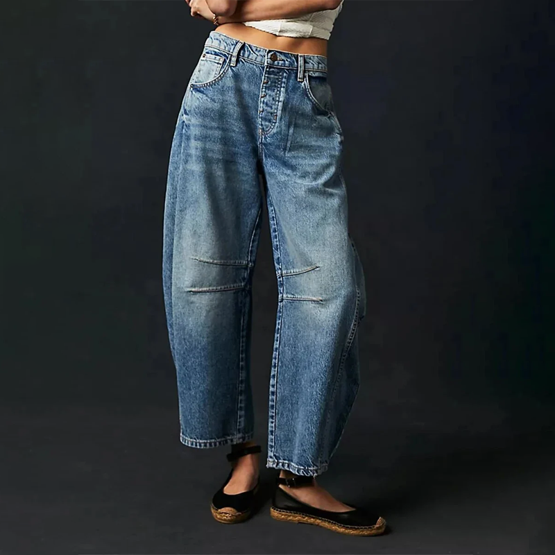 "Weite Damen-Jeans aus 100% Baumwolle in elegantem Design, betont Figur mit viel Bewegungsfreiheit, ideal für Alltagslooks."