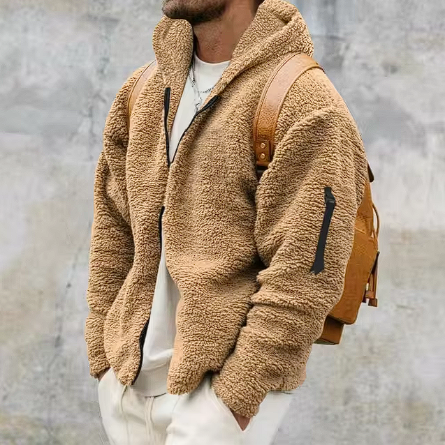 "Wetterfeste Herren-Winterjacke mit moderner Optik, Kapuze und Taschen, perfekt für Outdoor-Erlebnisse im Winter."