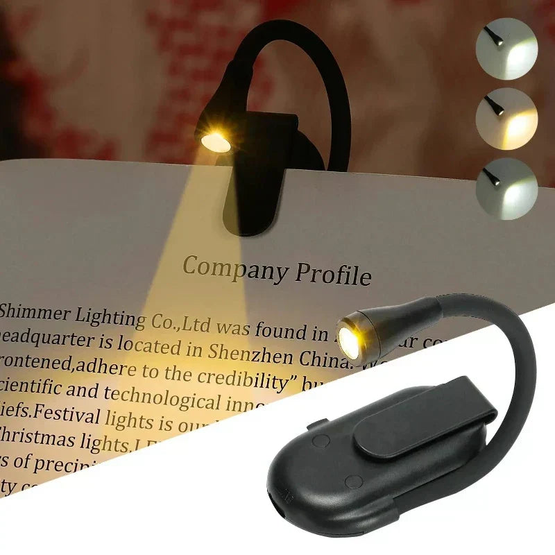 "Wiederaufladbare Buchklammer Leselampe in Schwarz, kompakt und tragbar, ideal für augenschonendes Lesen bei schwachem Licht.