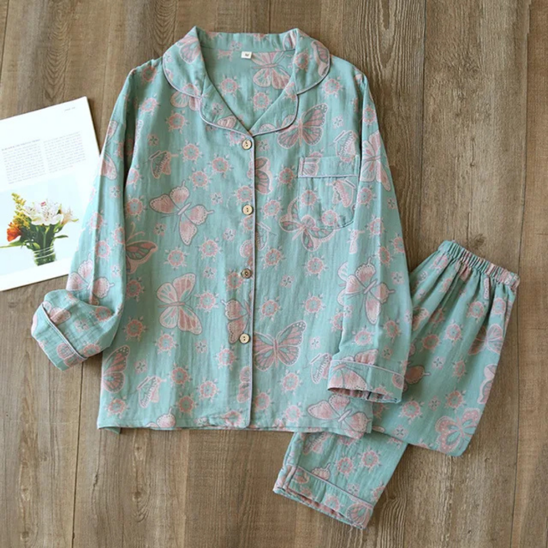Zweiteiliges Damen-Pyjama-Set mit Blumenmuster, weiches Material, femininer Look, ideal für komfortable Nächte.