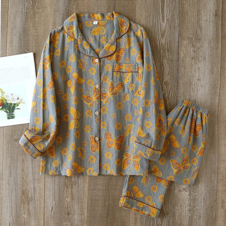 Zweiteiliges Damen-Pyjama-Set mit Blumenmuster, weiches Material, femininer Look, ideal für komfortable Nächte.